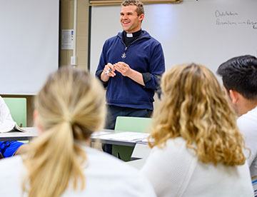 Photo of a teacher in class. Links to Gifts by Estate Note gifts_estate_note.jpg